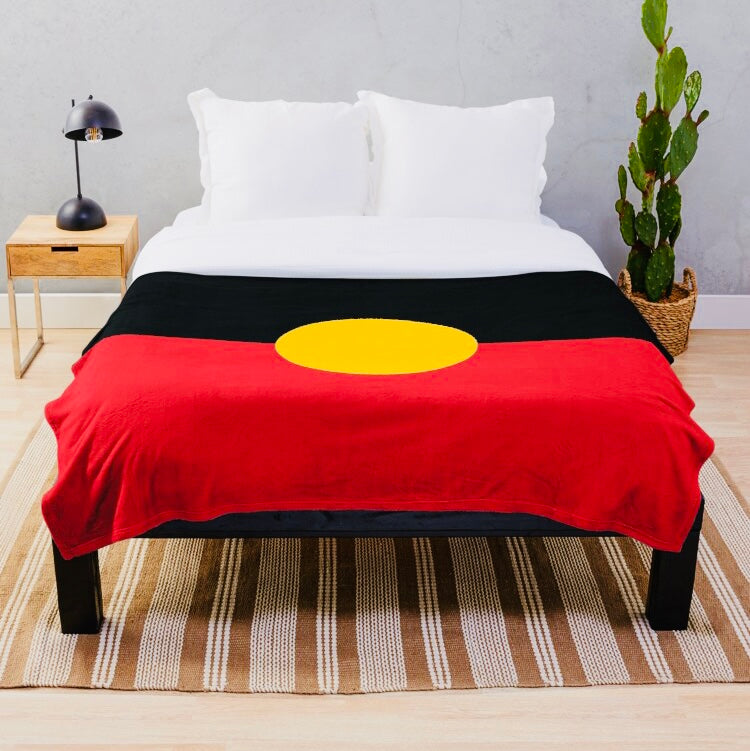 Australian Aboriginal Flag Flannel Blanket. Digital printed with colours Yellow, Red, Black, and reverse if off-white.